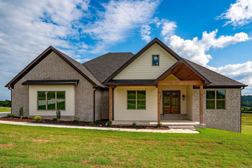Beautiful custom-built new construction 4 bed/2 bath Greenbrier home sits on almost an acre in Reynolds Ridge! Wonderful open floor plan with large living room and beautifully designed kitchen with custom cabinetry, quartz countertops, stainless steel appliances, center island, walk-in pantry & separate dining area. The primary suite features double sinks w/split vanities, soaker tub w/tile surround, tiled walk-in shower, & walk-in closet w/access to the laundry room. The guestrooms are all a great size & share a wonderful hall bath w/double sinks & tub/shower w/tile surround. The mudroom has built-in w/coat hooks, bench seating & cabinet/cubby storage. The exterior features nice landscaping, a gorgeous back deck, 2 car garage & huge lot.