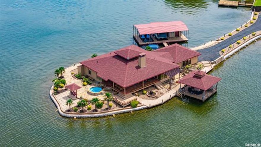 Welcome to 106 Farr Shores Bay, an extraordinary lakeside sanctuary nestled on a private peninsula with 600 feet of pristine shoreline. This one-of-a-kind property offers breathtaking panoramic views of Lake Hamilton, making you feel as if you’ve escaped to your own personal island.    This 1,900 sq. ft. single-level home features a wood-burning fireplace, central heating and air, and a spacious two-car carport. Thoughtful updates, including a new seawall (2021), new roof (2023), newly paved driveway (2023), and fresh siding and paint (2024), ensure modern comfort and low-maintenance living. Homes like this—where tranquility meets adventure—are a rare find. Don’t miss your chance to own this stunning, one-of-a-kind lakefront property. Schedule your private showing today!