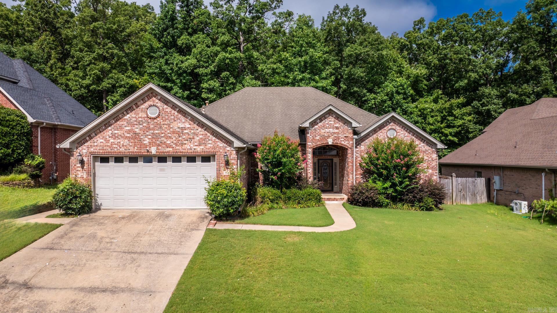 Welcome to this attractive 4-bed, 2-bath brick home offers 2,267 square feet of spacious living on a well-proportioned lot. The property includes a 2-car garage, and features a classic brick exterior with a neatly landscaped front lawn. Inside, enjoy a split-bedroom floorplan that provides both convenience and privacy for families or guests. The homeās layout flows seamlessly, offering a versatile living arrangement that adapts easily to everyday life. Positioned with quick access to I-430, Taylor Loop, and Cantrell Road, this residence combines quiet neighborhood appeal with easy commuting. Itās a practical, move-in-ready home in a well-regarded subdivision.