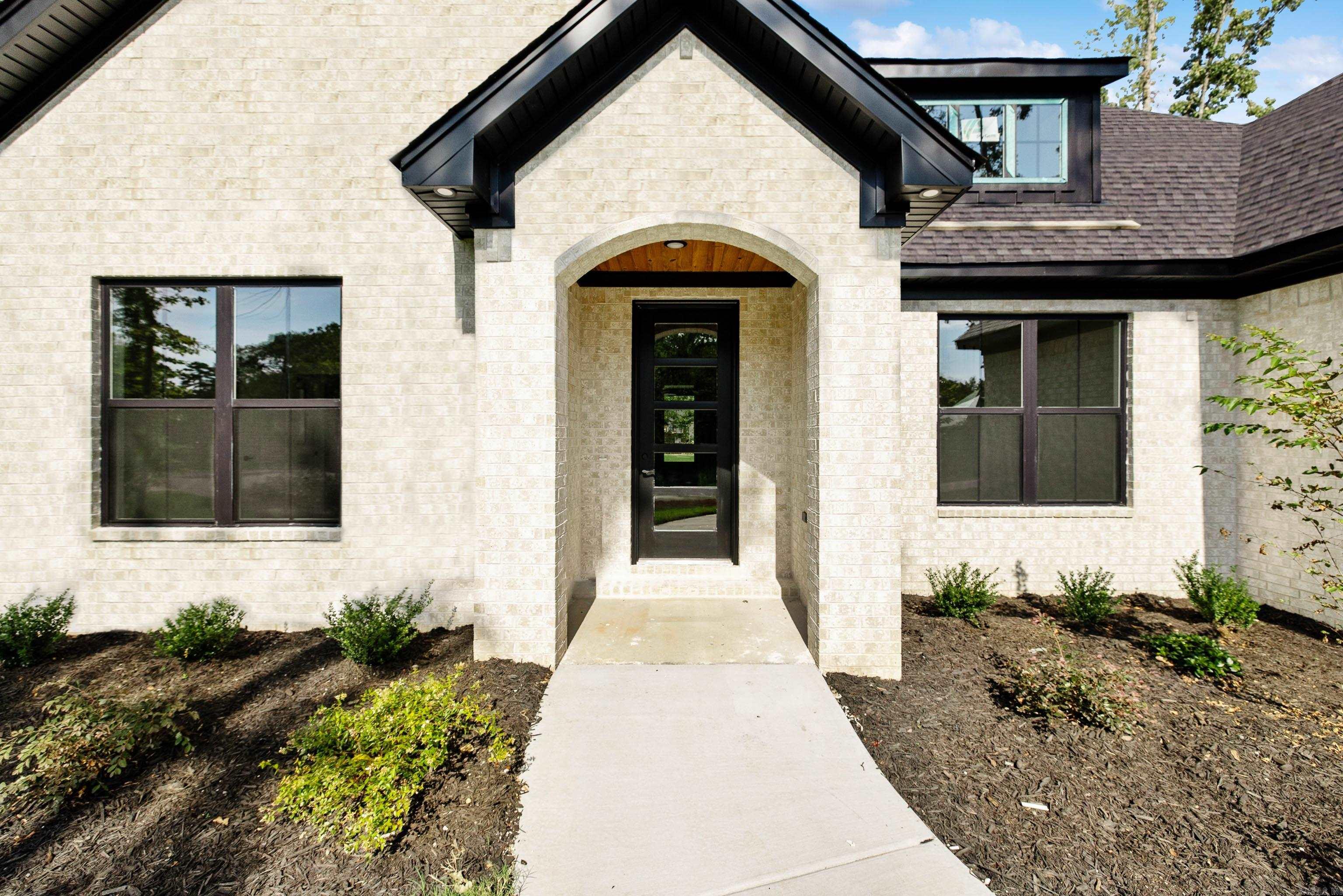 Stuning new construction home with lots of space and plenty of room on almost an acre. This home is a must see with lots of custom features. Open kitchen and living room with vaulted ceiling with beams. Kitchen offers a large island, custom cabinets, and walk in pantry. Living room has a wood burning brick fireplace with a separate office off the foyer. There is a large primary suite and walk in closet & bath. The backyard is beautiful and has lots of space.