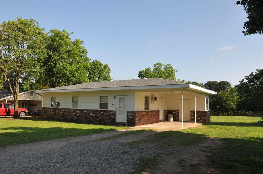 Clean as a whistle and updated, this house is a great buy!  Large kitchen/dining area.  Floors refinished, walls painted, bathroom redone.  W/D hookups in bathroom.  Brand new Gas WH, and gas wall heat installed recently.  Roof is only 2 years old.  Even has a dishwasher and refrigerator! 2 AC units remain with the house. All floors are vinyl tile, 1 room carpet.