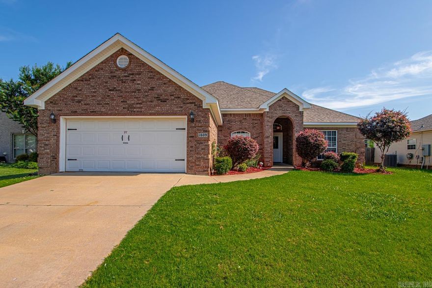 Turnkey and full of charm in the sought-after subdivision, The Oaks. This 3-bed, 2-bath home offers a perfect blend of elegance and comfort with thoughtful details, a new roof added in 2023, and abundant natural light. Inside, you’ll find an inviting open floor plan with tall ceilings, crown molding, and a light-filled living room featuring a cozy fireplace. The layout flows beautifully into the dining area and kitchen, creating an ideal setup for everyday living and entertaining. The home includes both a formal dining room and a casual breakfast nook surrounded by large windows. In the kitchen, you’ll find stainless steel appliances, abundant cabinet space, a raised bar for extra seating, and a large pantry. The primary bedroom is spacious and serene, with a tray ceiling and backyard views. The primary bath includes double vanities, a jetted soaking tub, a walk-in shower, and a large walk-in closet. Outside, you’ll love the curb appeal and the fully fenced backyard with a covered patio. Conveniently located just minutes from schools, shopping, restaurants, and I-30.