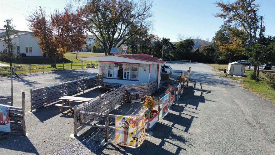 Welcome to a true community landmark! Maries Dairy Bar has been a beloved local gathering spot for generations. This iconic establishment offers a rare opportunity to own a well-known and well-loved business with nearly five decades of history and customer loyalty. The property features a classic walk-up service window or drive thru, ample parking, and a highly visible location that consistently attracts both locals and travelers. The building was updated and remodeled in 2024 with new electrical, plumbing, HVAC, extra bathroom for the public, POS system and drive thru ordering setup, and all new kitchen equipment  (a list can be sent on request) and Many other new features that keep the original look of the business while enhancing the dining and working experience alike. Don't miss out on a great business opportunity! Call today your agent today to schedule a viewing!