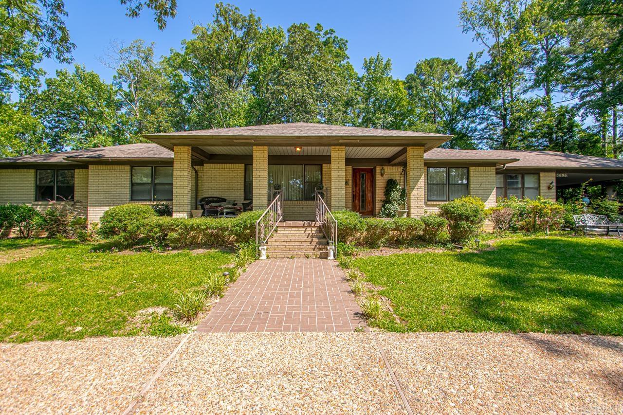 Located at 3006 Alcoa Blvd, this traditional-style home offers nearly 1.5 acres of private land and is situated within the highly regarded Bauxite School District. Featuring 3 spacious bedrooms and 2 full bathrooms, this home provides a comfortable living space for families of all sizes. The home includes a bright sunroom, ideal for relaxation, along with a formal dining room perfect for entertaining guests. A dedicated office space offers a quiet area for work or study. Additionally, the home boasts a heated and cooled basement, providing valuable extra living or storage space, as well as a separate workshop for your storage and project needs. Situated outside of a subdivision, this property offers both privacy and ample outdoor space while still maintaining convenient access to local amenities. With its combination of traditional charm and modern functionality, this home is an excellent opportunity for those seeking a peaceful, spacious living environment.