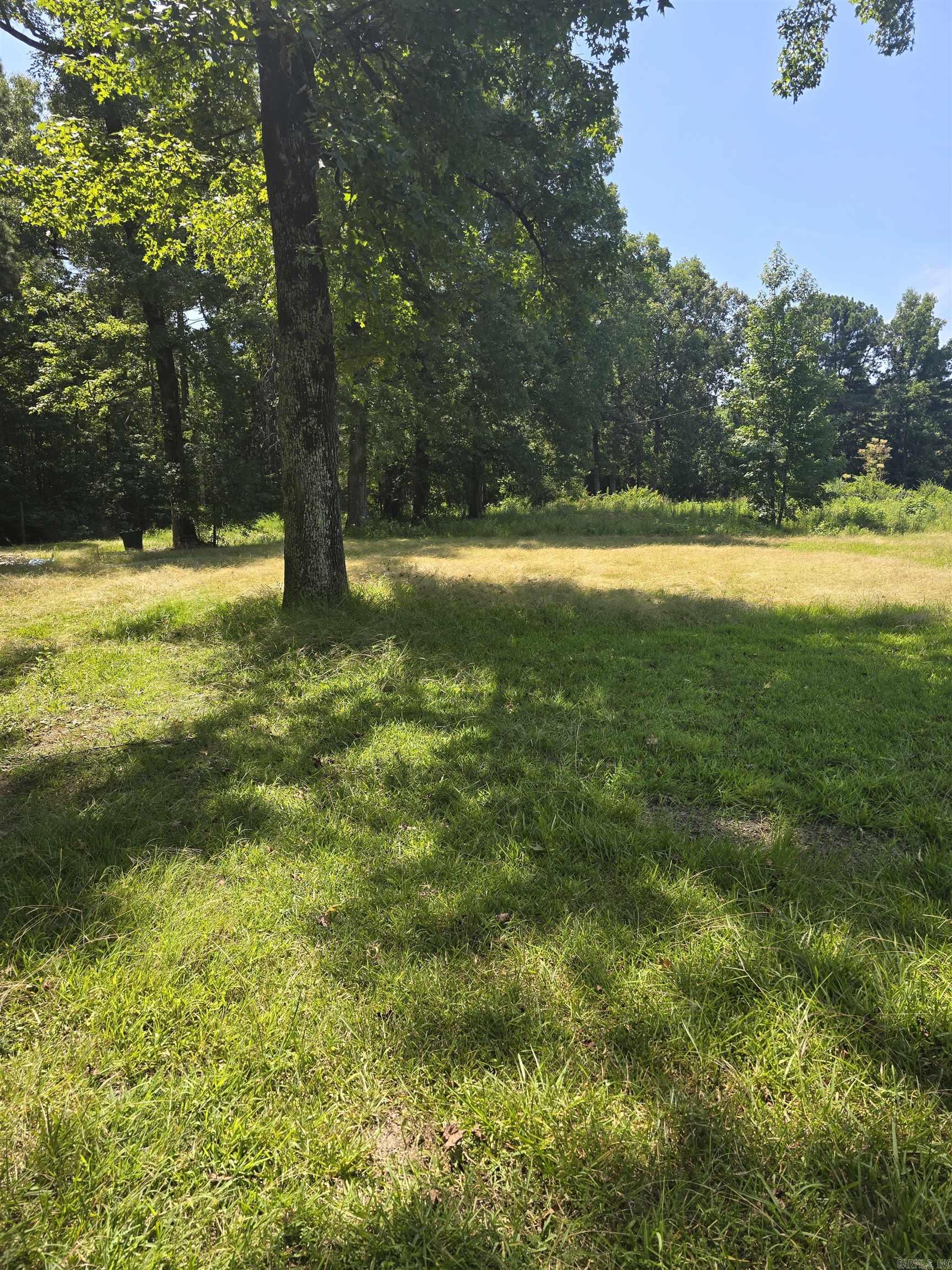 Discover the perfect investment opportunity just minutes from Saline County Airport with these three versatile lots, available individually or as a package. The property is fully cleared, featuring a convenient gravel drive that provides easy access. Whether you're looking for a solid investment or a new place to call home, these lots offer the ideal blend of location, accessibility, and potential. Don't miss out on this exceptional chance to secure a prime piece of real estate! Seller is willing to split into 3 lots. Please call or text listing agent for more information.