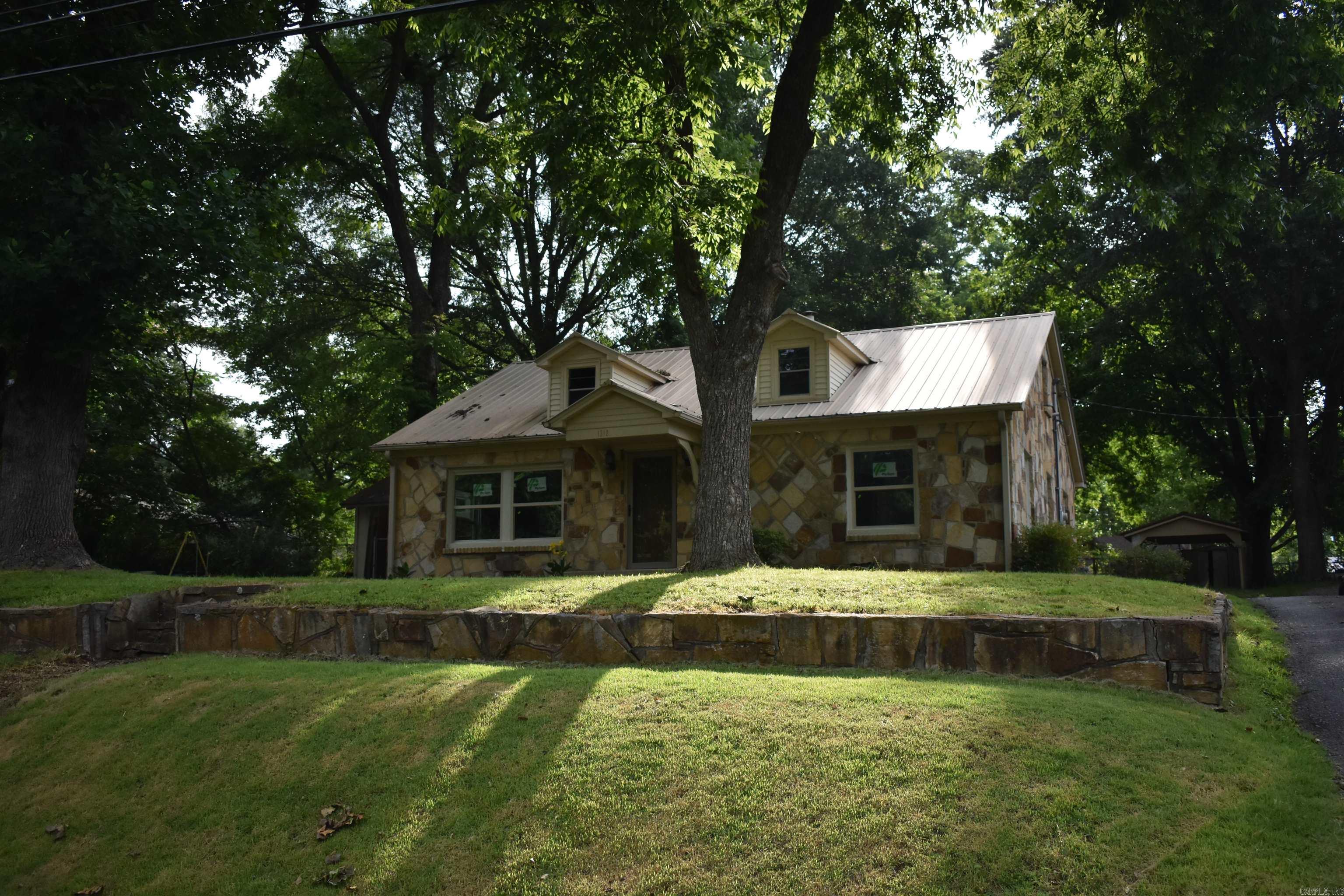 Newly remodeled 2 bedroom 1 bath home with lots of extras! Low maintenance metal roof with new gutters in 2020, HVAC replaced in 2019, HVAC Duct work 2021, electrical panel upgraded, water heater 2021, gas line 2020, new water resistant flooring, new countertops, soft close kitchen cabinets, new garbage disposal, all new lighting, separate fence enclosed dog run. 2 car attached carport and one car detached parking. Entergy solutions program 2024 (duct sealant, caulking, new attic blown insulation). NEW WINDOWS JUNE 2025 See attachments for Associated Documents for Survey, SPD, etc.