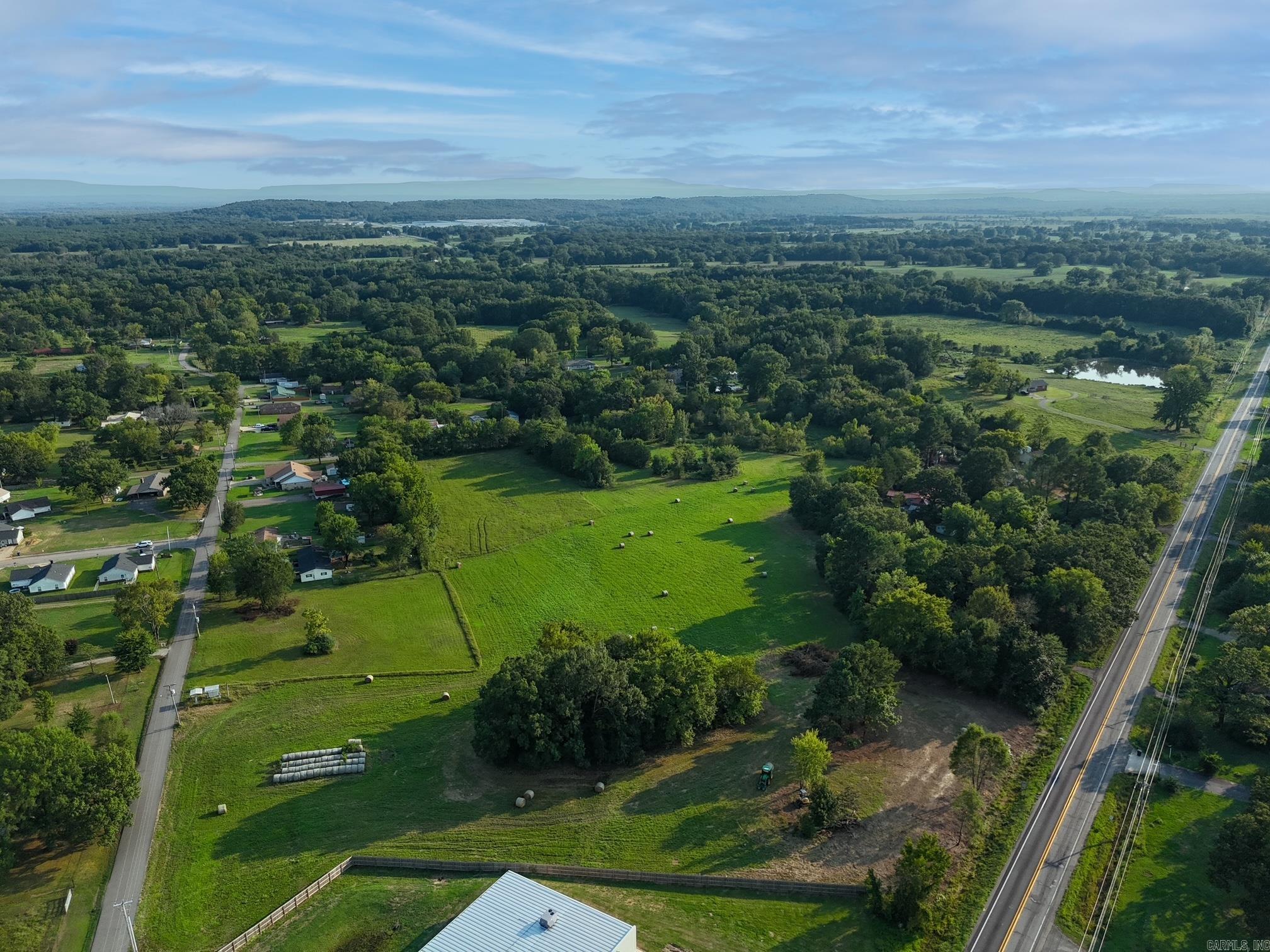 Prime vacant land opportunity near I-40! This 5.6-acre m/l cleared parcel is currently zoned R-2 with strong potential for commercial rezoning. Offering excellent visibility and easy access to the interstate, this property is ideal for development. Conveniently located near key amenities, including restaurants, retail shops, gas stations, and other commercial businesses. Perfect for investors or developers looking to capitalize on a high-traffic area. Don’t miss this exceptional opportunity!