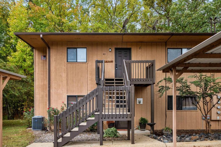 Charming 2-Bed, 2-Bath Condo in the Heart of Hot Springs! Welcome to this inviting 2-bedroom, 2-bathroom condo conveniently located in the heart of Hot Springs. Enjoy peaceful wooded views from your private balcony, perfect for relaxing or entertaining. The spacious living area features an electric fireplace, Beautiful patio door that fills the space with natural light. The primary suite offers two walk-in closets and a private en suite bath for added comfort. Community amenities include a sparkling pool and scenic walking trail.  Located near shopping, dining, medical facilities, and entertainment, this condo offers the perfect blend of convenience and tranquility. Ideal for a full-time residence, weekend retreat, or investment property.