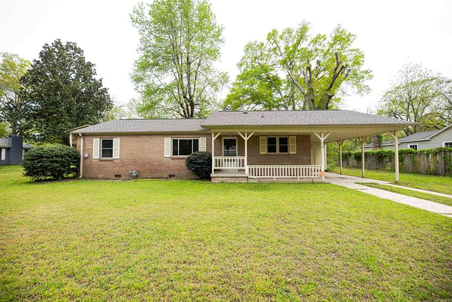 This solid brick home offers comfort, functionality, and thoughtful updates throughout. Nestled on a shady, level lot, the property provides a welcoming outdoor setting complete with a covered back patio—perfect for relaxing or entertaining.  Inside, you’ll find a fresh, modern color palette that creates a bright and inviting atmosphere. The spacious laundry area doubles as a practical entry point, leading to a convenient mudroom—ideal for keeping everyday life organized.  Recent upgrades include a brand-new roof (2024) and newer energy-efficient windows, adding peace of mind and helping reduce utility costs. For those with recreational vehicles or extra equipment, the property also features an RV outlet and protective cover.  A well-maintained home with valuable updates and versatile features—ready for its next owner to enjoy.