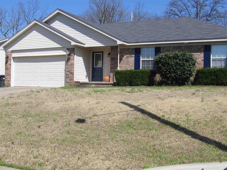 Well maintained 3 bedroom/2 bathroom home in quiet neighborhood.  Home has wood and tile floors throughout. Wood window blinds 2012.  New roof 2010, new water heater 2013, garage door opener 2013, new stainless steel gas oven 2013, new back door 2015.  Updated exterior light fixtures, and bathroom faucets.  Back yard she'd had floor replaced 2014.  Seller will provide home warranty.  Refrigerator negotiable.