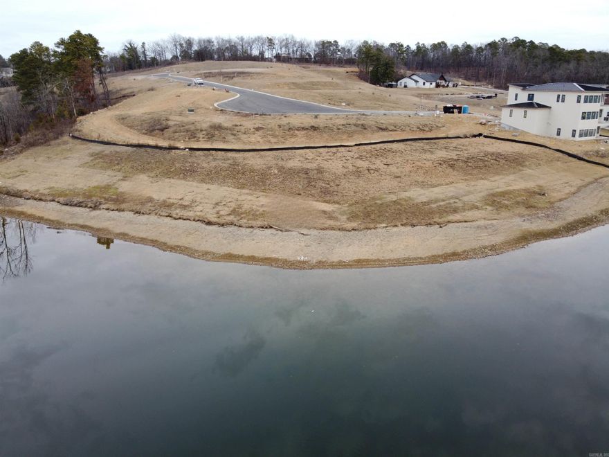 PRIME LAKE HAMILTON LOT with Stunning Views & Ideal Location! Discover the perfect opportunity to build your dream home on this magnificent Lake Hamilton lot! Boasting breathtaking panoramic water views, this premium buildable lot offers the perfect canvas for your lakefront retreat. Centrally located in the heart of Hot Springs, this property provides easy access to all the city’s top amenities—shopping, dining, entertainment, and the renowned Hot Springs National Park—while still offering the peaceful, scenic beauty of lakeside living. Whether you're looking for a weekend getaway or a full-time lakefront home, this lot is an exceptional find. Don't miss the chance to own a slice of paradise on Lake Hamilton! Prime Location | Build-Ready | Stunning Views