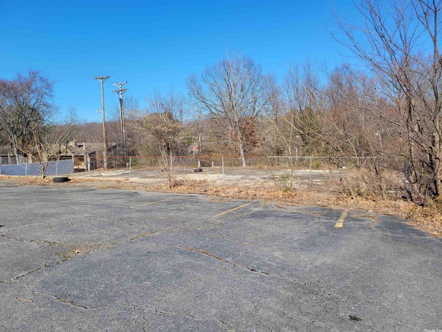 Commercial development property located near the very busy intersection of North Hills and Hwy 107/JFK Boulevard in North Little Rock. Property includes a paved parking lot with approximately 20 parking spaces. A great location for any small professional service. Several restaurants, shopping, and multifamily properties nearby. Bring all offers!