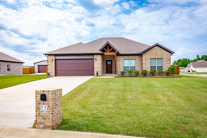 This beautifully crafted, newer construction home offers modern living with a touch of country charm. Situated on a spacious half-acre lot, this 4-bedroom, 2-bath residence provides a functional and elegant layout ideal for families and entertainers alike.  The heart of the home features an open-concept kitchen that seamlessly flows into the living area, enhanced by coffered ceilings that add architectural interest and a sense of grandeur. The split-bedroom floorplan ensures privacy for the primary suite, which is thoughtfully separated from the secondary bedrooms.  Outdoors, you'll enjoy a fully fenced backyard, perfect for pets, gatherings, or simply relaxing in a peaceful setting. Located just minutes from town, this home offers the best of country living with close proximity to in town conveniences.