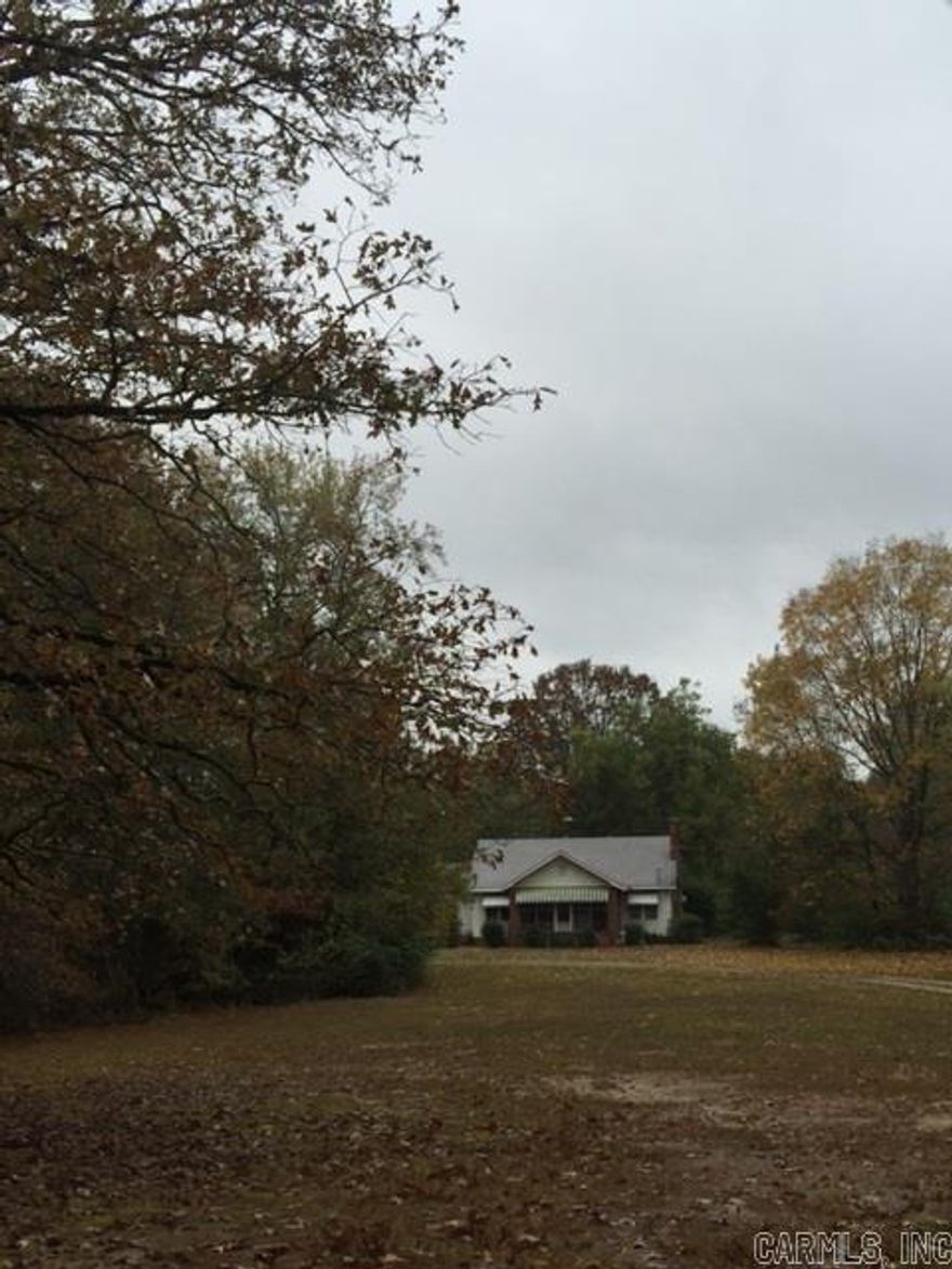 Cute home with outbuilding located about 5 miles outside of City limits.  Property has 2 acres of land with a good part of the land being cleared.  Lots of potential.  BRING ALL OFFERS - SHOW AND SELL.  ALL CONTRACTS/OFFERS ARE SUBJECT TO OneWest Bank Mortgage Servicing, a division of CIT Bank, N.A. SENIOR MANAGEMENT APPROVAL AND ANY OFFERS OR COUNTER OFFERS BY OneWest Bank Mortgage Servicing, a division of CIT Bank, N.A. ARE NOT BINDING UNLESS THE ENTIRE AGREEMENT IS RATIFIED BY ALL PARTIES.