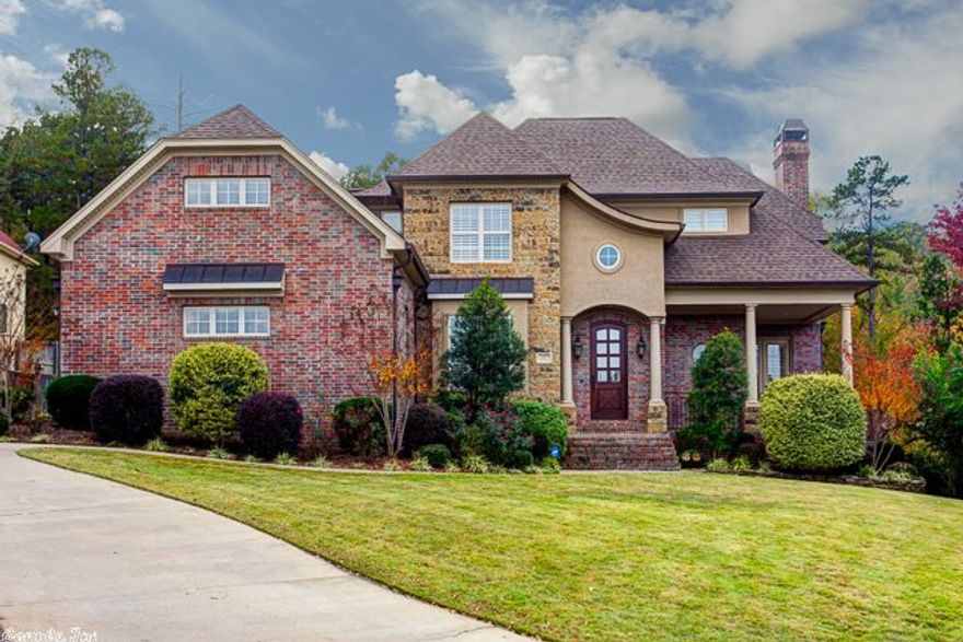 Wonderful Custom built home in The Courts! Chef's kitchen featuring gorgeous brick floors, Viking appliances, 6 burner gas range, a Cook's dream kitchen!! Beautiful hardwoods, stone fireplace, exposed wood beams, plantation shutters, butler's pantry, safe room are just a few of the amazing features of this home! Master suite has luxurious bath and huge closet. Upstairs are 3 bedrooms each having their own bathrooms with a bonus room that can be the fifth bedroom plus office!  Yard backs up to green space!!