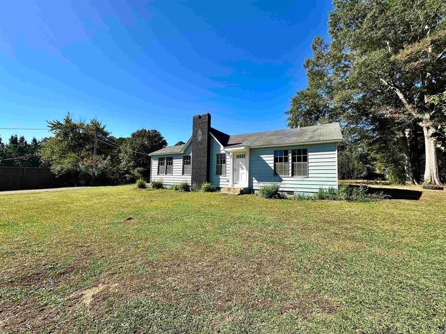 This cozy 3-bedroom, 1-bath home sits on a full acre in town. It’s got a great mix of updates and character—ready for you to move right in and make it your own!  Inside the living room has a welcoming feel with a fireplace that’s perfect for chilly nights. Spacious bedrooms , and the bathroom is a standout—featuring a big walk-in tiled shower and a separate bathtub.  The home has been updated throughout but still keeps that warm, lived-in feel. Outside, there’s plenty of room for a garden, pets, or just enjoying the open space and quiet. Give us a call today for a private tour!  If you’re looking for a comfortable home that’s not too far from town but gives you room to breathe—this is it.