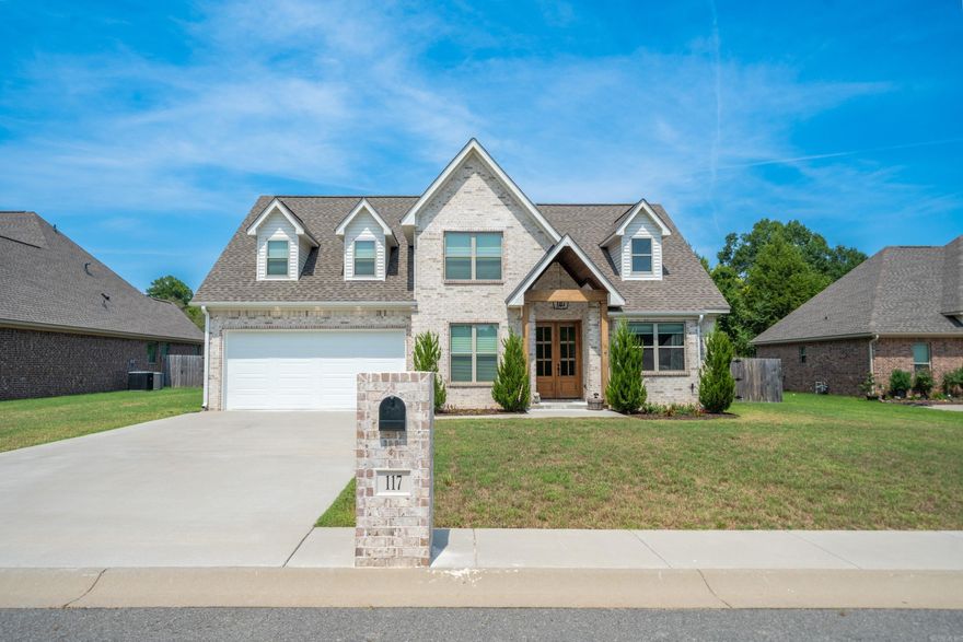 Newly built in 2022, this cozy and beautiful modern rustic two-story home is located just 5 minutes from Oaklawn, 10 minutes from Downtown Hot Springs, 45 minutes from Little Rock, within the Lakeside School District in a safe neighborhood and no home owners association! A spacious 2,829 square foot layout includes custom eye-catching details, numerous windows for natural light, live edge countertops, an all-rock gas fireplace, and rustic wood beams among its five bedrooms, 2.5 bathrooms, huge den and an office. On the first floor, there is an open concept with an office, a spare bedroom, and a vaulted master suite with an oversized soaking tub, a walk-in shower, and a private toilet room. An approximate 500 square foot bonus room and two additional bedrooms (one with a spacious walk-in closet) can be found on the second floor. LVP flooring throughout, carpet upstairs, tile bathrooms, a built-in dog kennel beneath the stairs, front and back yard sprinklers, a fully fenced backyard, and a covered patio with a gas line are some additional features. This stunning home was built with no expense spared and been kept in immaculate condition! Make this gorgeous house your home!