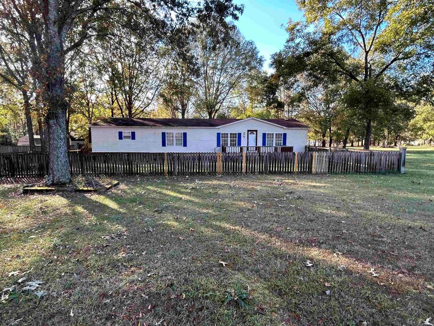 Manufactured home that is on a 1.35 acre lot. Large kitchen with plenty of countertop space. Three nice size bedrooms plenty of closet space. Two living areas. Nice deck out front to set out on or sit out back in your covered screened porch. Also a large storage shed conveys with the home. AC condenser and heat pump are 4 years old. **SOLD AS IS**