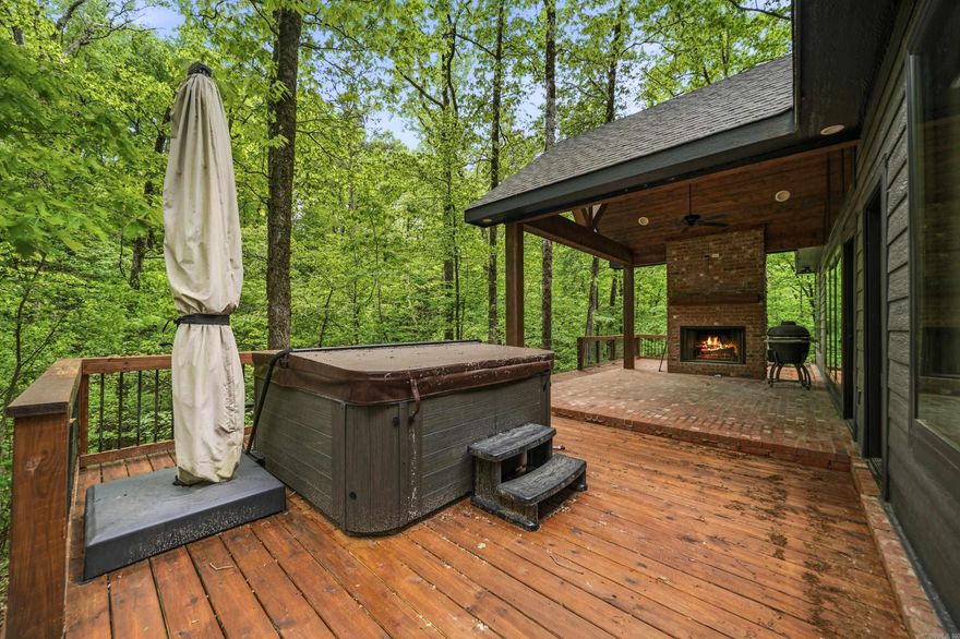 You do not want to miss this luxury lake home!  Escape to your own private paradise with this stunning 3 bed, 2 bath cabin + loft, perfectly nestled on 4 acres inside a breathtaking national forest   This property is the definition of peaceful luxury:  Indoor fireplace for cozy nights Outdoor fireplace on the back patio for entertaining under the stars Gas stove for the ultimate cooking experience Serene creek running along the back of the property Private hot tub to relax and unwind Fenced with gated entry for added privacy and security  Located just 4 miles from Crystal Springs Marina and Mountain Harbor Marina — enjoy boating, fishing, and lake days whenever you want!  Whether you're looking for a full-time retreat, vacation home, or income-producing property, this cabin truly has it all.  Privacy. Luxury. Nature. Convenience.  Message me for more details or to schedule a private showing!