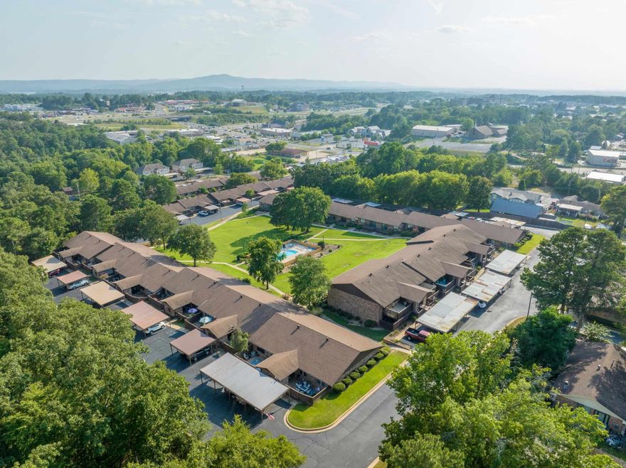 Welcome to your serene retreat in the heart of the vibrant 55+ community! This charming one-level condo boasts two spacious bedrooms, two baths, and a captivating view from the deck overlooking the sparkling pool. With its convenient layout and picturesque surroundings, this home offers a perfect blend of comfort and tranquility for your retirement years. Don't miss the opportunity to make this your own slice of paradise! Condo fee includes water, sewer, trash, all ext maintenance, pool, mowing, plus common area insurance.: All appliances convey. 7 days first right of refusal. No short term rentals. New Roof, Gutters, and Carport coverings.