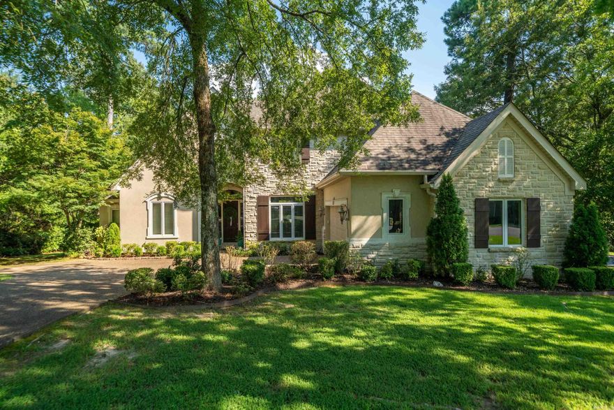 Welcome to this stunning custom-built home located in the highly coveted Lotus Valley Subdivision! Built in 2002, this beautiful 4-bedroom, 3.5-bath residence sits proudly on a spacious corner lot—offering exceptional curb appeal, thoughtful design, and plenty ofroom for the entire family. Step inside to find a bright, open floor plan with elegant details throughout. The main level primary suite is atrue retreat, featuring a cozy sitting area, an expansive en suite bath with soaking tub, walk-in shower, and dual vanities, plus generouscloset space. The formal dining room and large living area are perfect for entertaining, while the eat-in kitchen boasts custom cabinetry,top-of-the-line appliances, and plenty of workspace for any home chef. Upstairs, you’ll find three additional bedrooms, two full baths, anda huge family den/media area—ideal for movie nights or a playroom. The home also offers ample storage and a bonus garage/workshopspace beneath the house, providing endless functionality. Outdoor living is a dream here—relax or entertain in your private backyardoasis, complete with an in-ground pool, outdoor kitchen/bar, and plenty of patio space for gatherings. Sitting on a doubl