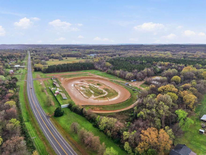 We have a racetrack that includes everything racetrack and highway frontage of a quarter of a mile and timberland that lines the half of a mile of freeway. Possibilities are endless here!! Car dealership, subdivision, farm, timber farm, and an already functioning race car track fully equipped with licensing. Highway on one side, freeway on the other side. Planted timber for farm or ranch hunting property