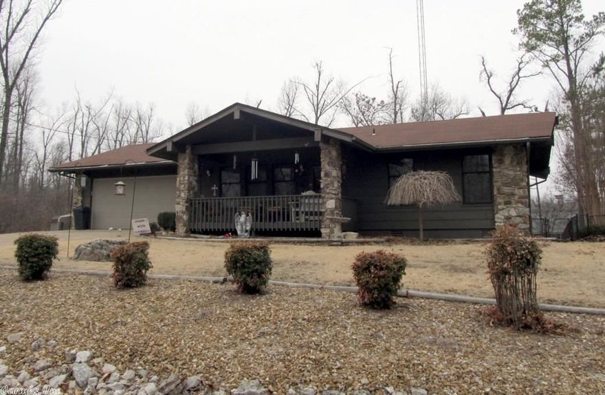 House on 2 Lots. With lots of space. This home offers 2 bedrooms, 1-3/4 baths, heat pump installed in 2014, brand new hot water heater, living room with gas log fireplace, sun room, utility room and 2-car garage. All this on 2 lots with a nice fenced back yard.