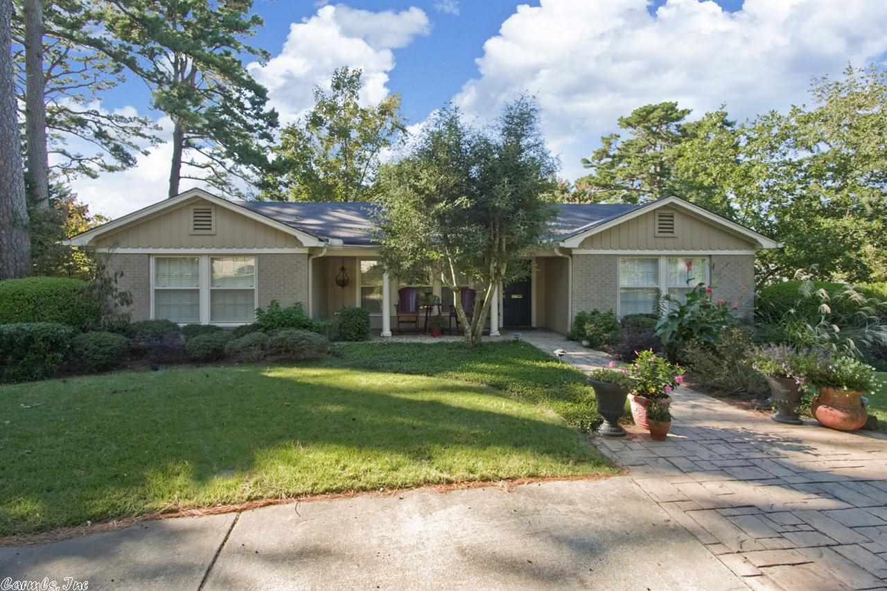 Beautiful hidden gem has loads of updating. Large kit/bkft w/vaulted ceiling&all the appliances-new gas cooktop w/grill in middle, ice machine, built-in refrigerator, slab granite countertops, large window over sink overlooking .76 acre lot. New master suite has new bath&huge closet&place for stack washer. Picturesque deck. Lower level has 3 bedrooms, big den&patio, 2 baths, big laundry rm, loads of storage. Triple carport behind auto gate. Bsketball court, green house, workshop, big play set for kids.