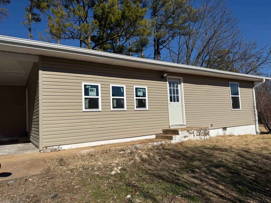 This 3 Bedroom 1 Bath home is located in beautiful Mammoth Spring Arkansas, home of one of the largest springs in the world, Mammoth Spring pushes out an astonishing nine million gallons of water every hour. That flow creates a 10-acre lake before feeding the Spring River, a beloved Ozark destination for trout fishing and floating. The beautiful falls is a favorite public attraction. There's also the 1886 Frisco train depot & museum along with walking trails, playground, picnic areas, baseball field and the Arkansas Welcome Center & Gift Shop.  This is a great place to call home! This home has been fully refurbished.  All new floors, paint throughout, new bathroom & kitchen fixtures and appliances. New roof and new central HVAC system and new water heater.  You could call this a new home. It's on a very nice corner lot with lots of yard space, some shaded. City water. All electric home. Come check it out. Own your piece of the beautiful Ozarks!