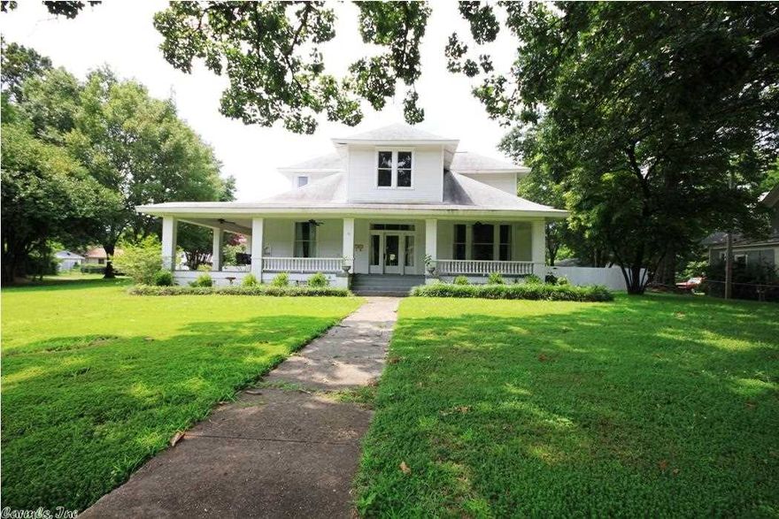 Old Malvern"Young"estate on Nat'l Registry of historic homes! Beautifully situated on 2 lots on corner-almost an acre. Cov'rd wrap around porch is heart throbber! $100,000 of extensive updates from foundation, electrical, plumbing to back of house taken down to studs & redone. Kitch knocked out w/granite, ss gas stove, 2 ovens, island, pantry. Sweet laundry! Eat-in kitch & form din.Tall ceilings thruout. Roof '08.Detached 2 car gar. Partially cov'rd deck overlooks fenced yrd. Picturesque! Visual Tour online