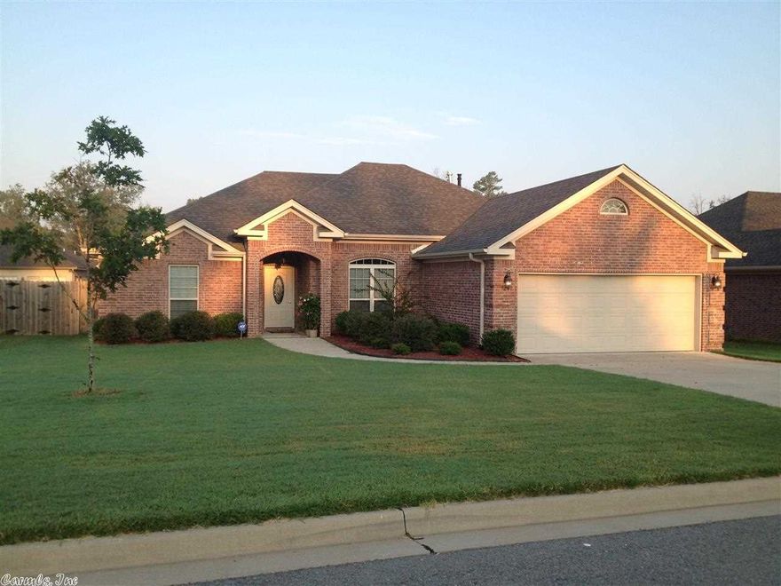 Beautiful brick home in WLR Kenwood Estates custom built by Davis Fitzhugh w/open floor plan, raised ceilings, custom mantle, crown molding, slab granite in kitchen + SS appliances & double marble vanities in bath, box ceiling in master + oversized closet. Updates by it's one owner*upgraded flooring, granite, backsplash, cabinets & lighting when purchased. Builder extended back patio for hot tub which DOES convey! Surround sound in living area & Security system w/motion detectors. See Agent remarks.