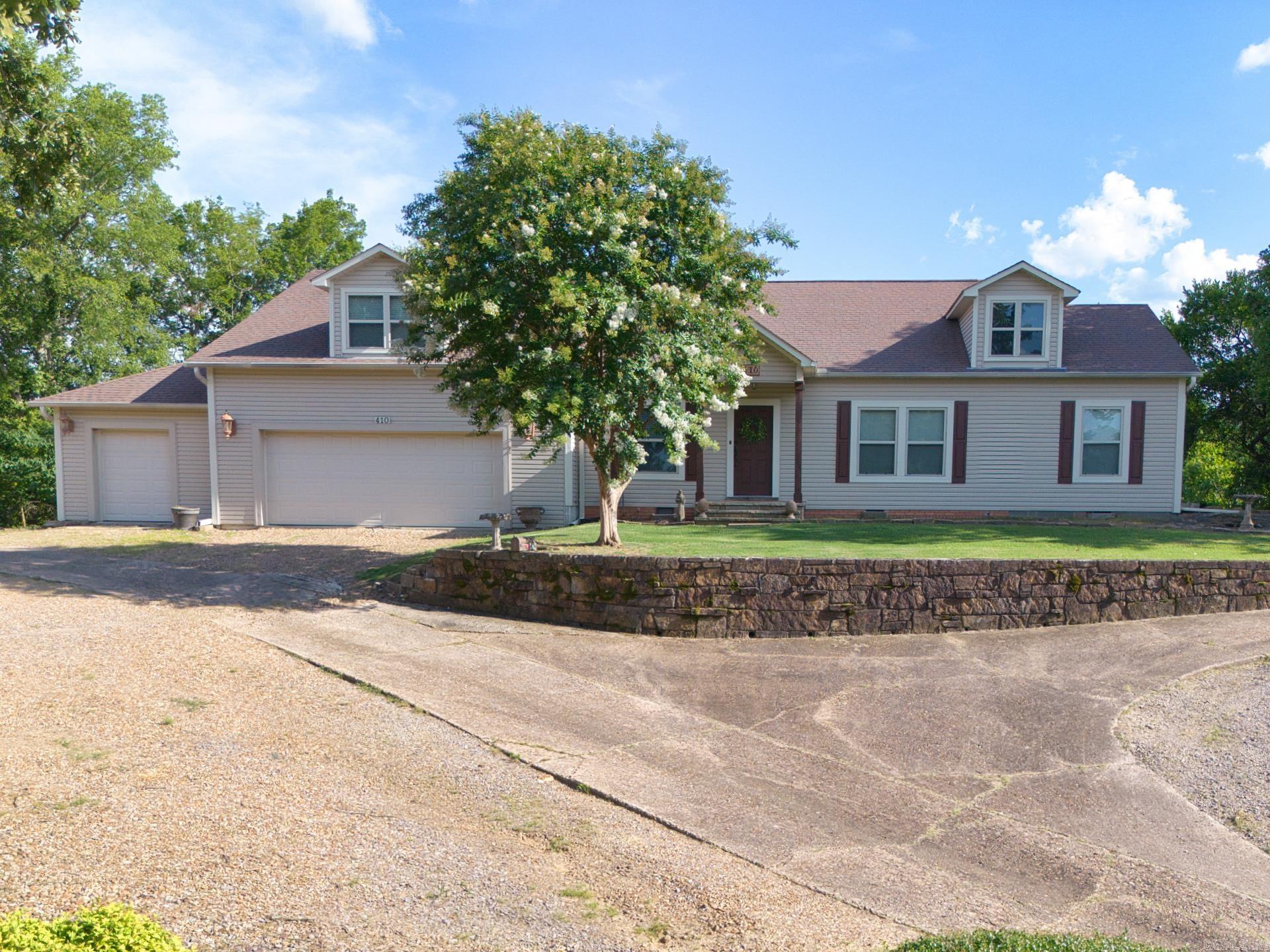 This home is a true showplace!! There was a total update and addition done in 2008. Crown molding in EVERY room! Spacious living room and large formal dining area! Kitchen has beautiful granite tile countertops and double convection oven making baking a breeze! Separate laundry room. One bedroom has an additional room that makes for a great office/study room. Upstairs you will find the big primary suite with 3 closets & a full bath including 2 separate vanities and a large shower! Nice size wood deck, 2-car garage & workshop, and lots of storage in this home! One CH/A unit was replaced in June 2025, the other was replaced in 2021. One water heater replaced in 2023. This beautiful home is a MUST SEE!!