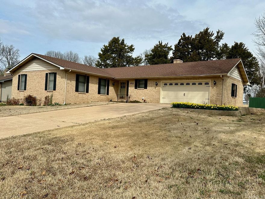 Brick home located on Twin Lakes Golf Course.