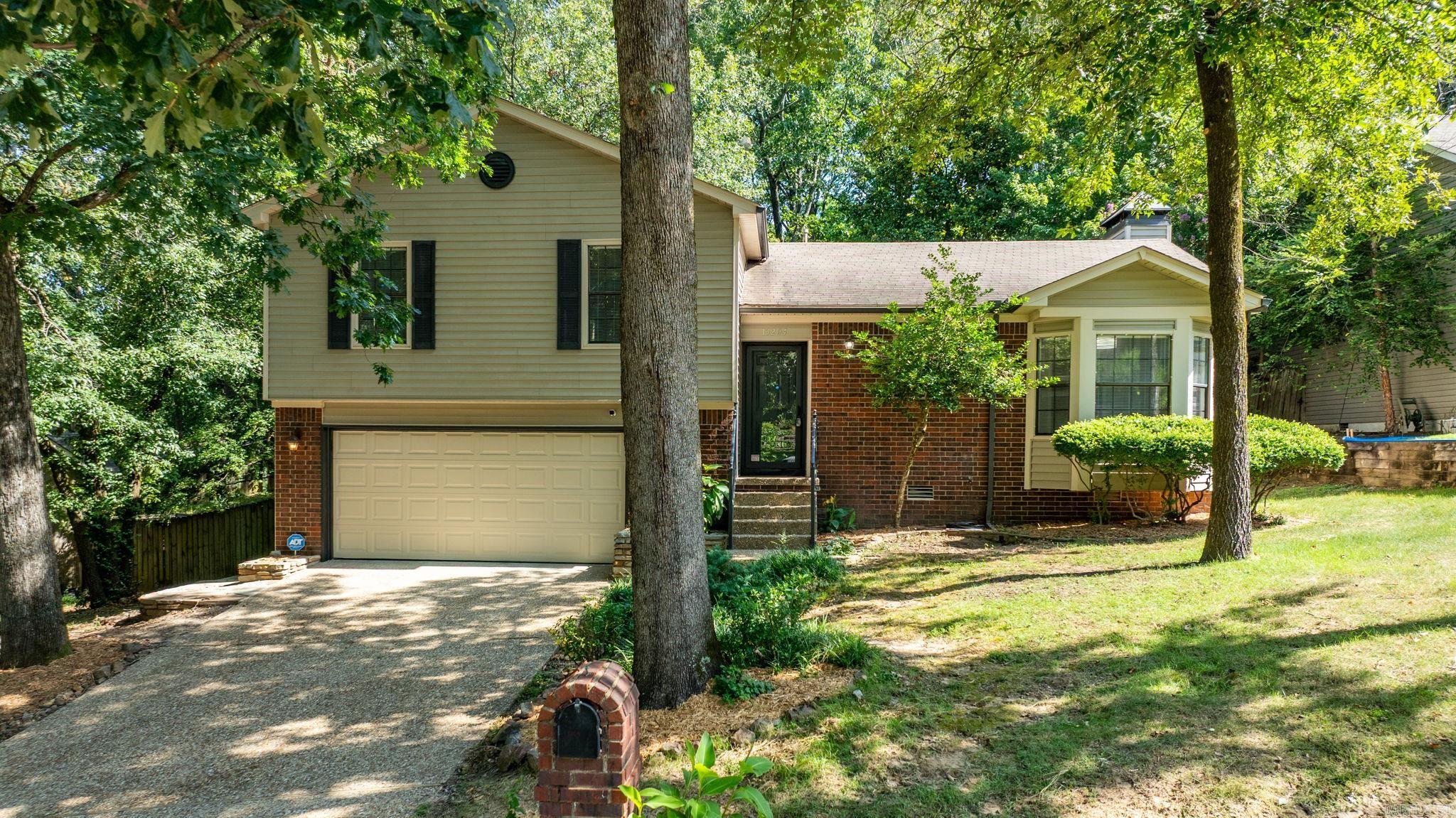 Nestled in a quiet area between Kanis and Chenal at the very back of neighborhood, this newly updated 3 bedroom 2 bath home plus office/bonus room features new paint throughout. In the kitchen there are new appliances, new granite countertops, new sink and new touchless faucet. New carpet in all the bedrooms. New HVAC system was installed. Large deck on the back with minimal step down to the large yard with minimal slope. Yard includes several mature trees. Home is bright and clean with lots of extra closets. Downstairs is a bonus room or office area off the garage. Two new garage doors have been installed. Walk in from garage to new mud room area and storage closet to the right. Lighting fixtures updated through out and doors replaced. Living area has vaulted ceilings with large windows over looking the quiet backyard. Wood burning fireplace has gas starter (gas has been capped). Siding power washed and new paint on outside of house. This one is ready to move in. **see agent remarks