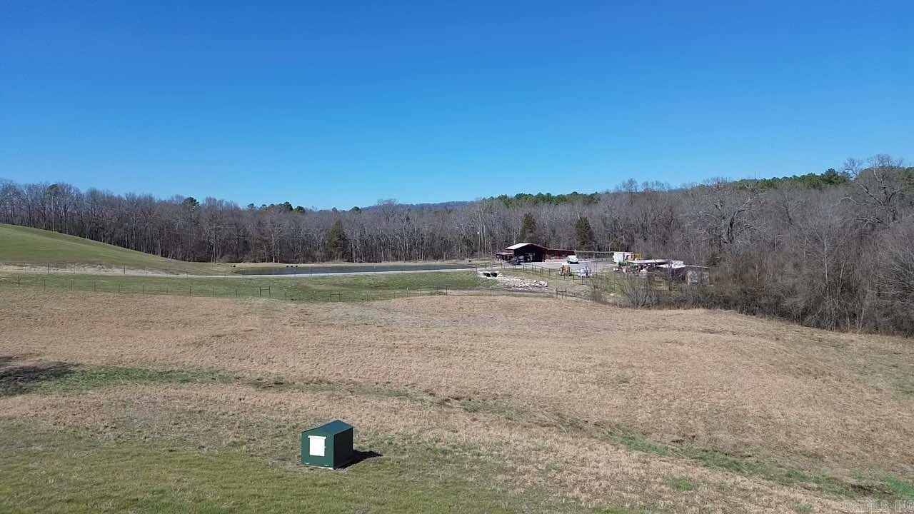 Looking for a beautiful spot to build your dream home? Take a look at this lovely property in Norman, not far from the Caddo River! BRAND NEW WELL with insulated well house (120 ft. deep and 30 gallon per min pressure!), a brand new road, a 56x46 build site, a shared pond, and the property is fully fenced! Recently surveyed with a current easement description! If you're looking for gorgeous views, and a peaceful place to reside, this place could be it!