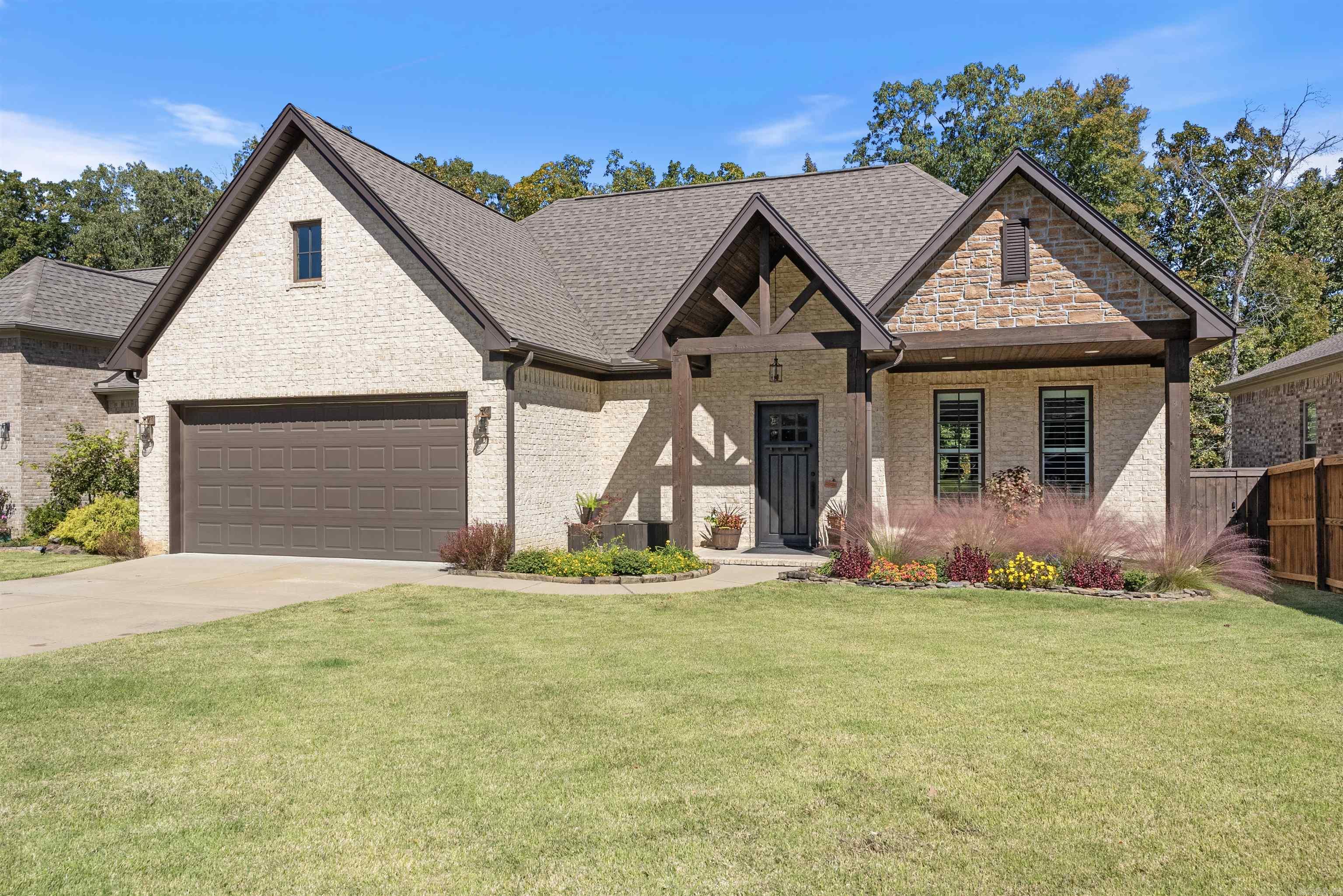 This beautiful home sits within the Gap Creek community, which has a private park and gorgeously maintained walking trails. This newer construction, is only 6 years old. It boasts high ceilings, 8 foot solid wood doors, engineered hardwood floors, quartz countertops, a gas range, stone fireplace powered with gas, tons of closet space - as well as some unexpected luxury features! It has wooden shutters on the front, but electric shades that can be raised or lowered with the push of a button! Store your holiday decor with ease, because there is a full staircase attic access (no pull down ladders in here!). The master closet is big enough to store and use a twin sized mattress if you have company visiting. The crawl space is pristine and tidy - while also being open enough to store all of your lawn equipment. Take a seat on your back porch and relax knowing that you've bought an outstanding, well built home that has been immaculately cared for. Reach out to schedule your private showing today!