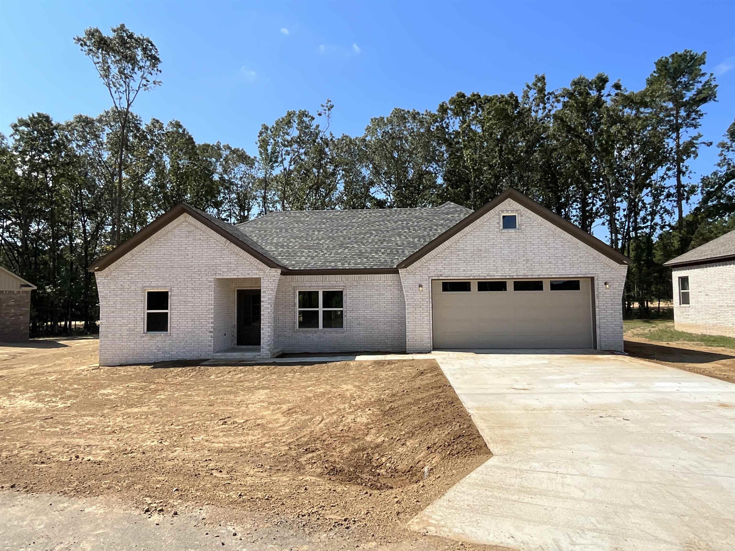 What a great house plan! 2 x 6 walls in this home! Large living room open to the kitchen. Kitchen has beautiful quartz countertops that continues to the backsplash. Big corner pantry. Laundry room is off the kitchen area. Laundry room is large with cabinets and a countertop perfect for folding clothes. Primary bedroom has a large walk in closet and the primary bathroom has a large shower and nice set of cabinets for storage. Private water closet. Guest rooms are separate from the primary bedroom. All closets have customizable shelving. Flooring is LVP throughout and laid on a diagonal for extra pop. Has a nice yard with trees in the backyard for privacy.