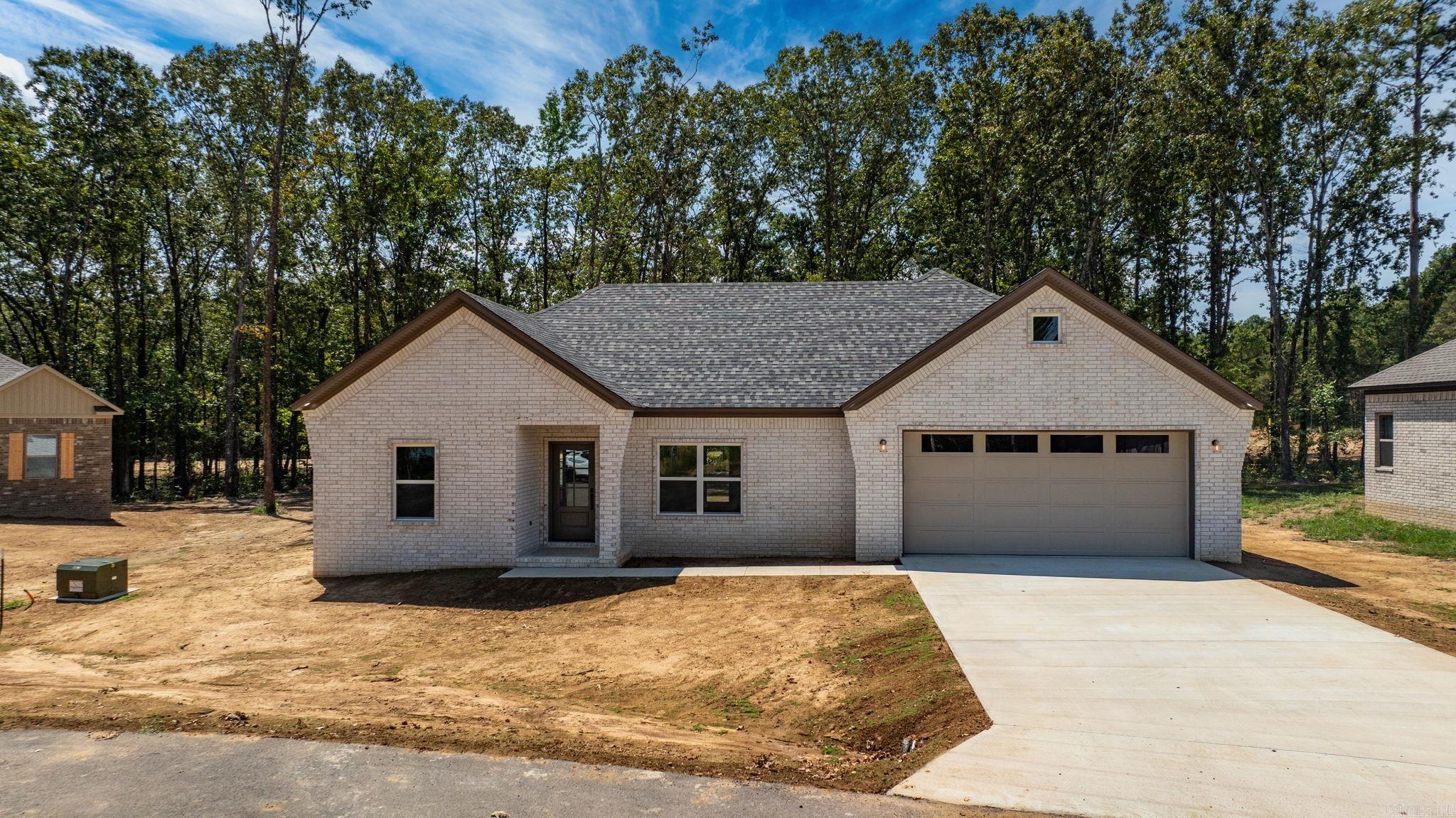 What a great house plan! 2 x 6 walls in this home! Large living room open to the kitchen. Kitchen has beautiful quartz countertops that continues to the backsplash. Big corner pantry. Laundry room is off the kitchen area. Laundry room is large with cabinets and a countertop perfect for folding clothes. Primary bedroom has a large walk in closet and the primary bathroom has a large shower and nice set of cabinets for storage. Private water closet. Guest rooms are separate from the primary bedroom. All closets have customizable shelving. Flooring is LVP throughout and laid on a diagonal for extra pop. Has a nice yard with trees in the backyard for privacy.