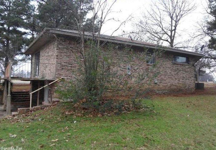 Large 3br/2ba home on +/- 1 acre lot!  Shop with kitchen/bedroom/living room.  Tons of space with den and separate dining room.  For information on bidding, Earnest Money procedures and more, visit:  www.HUDHomestore.com .