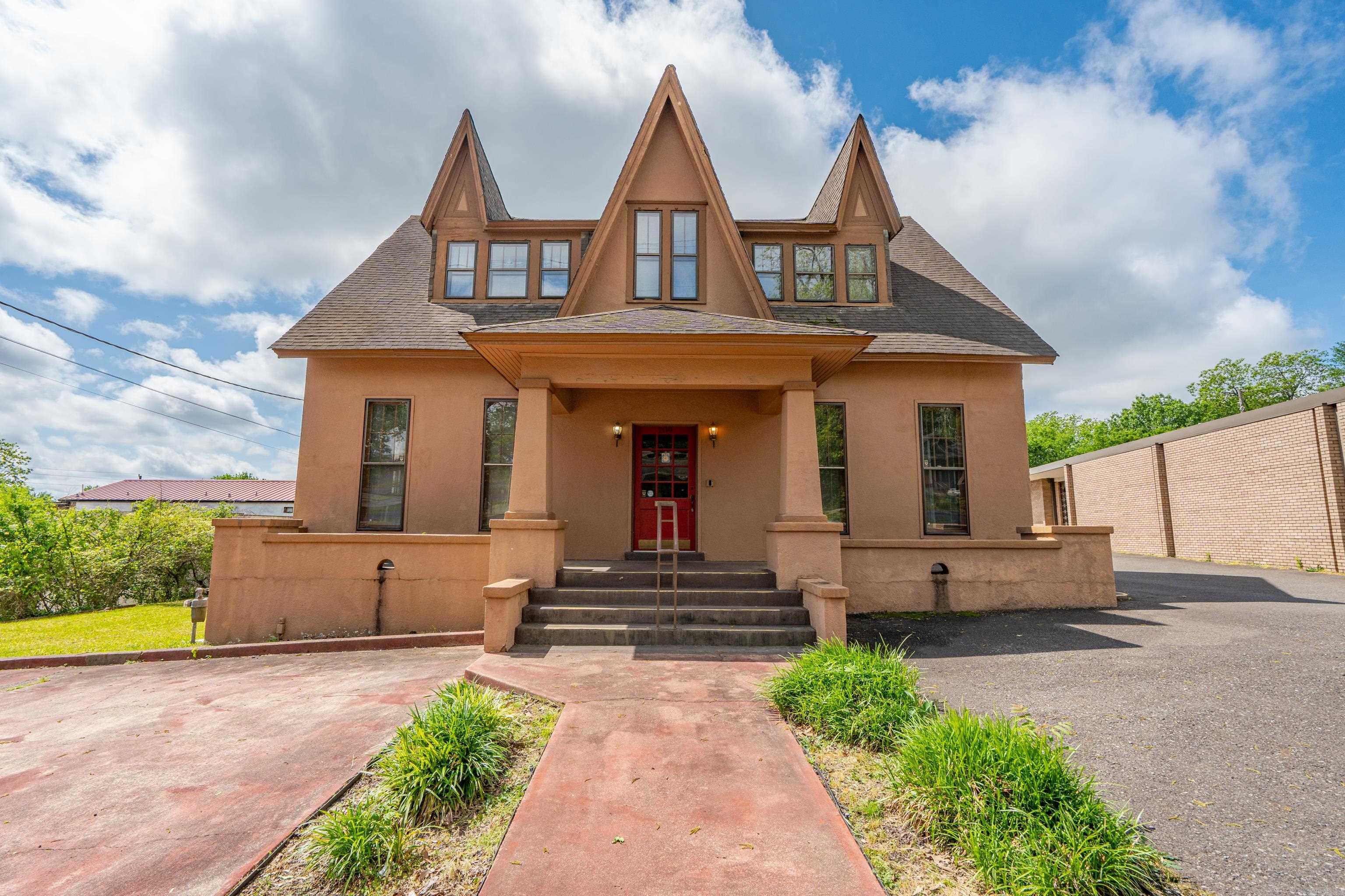 Commercial building centrally located and close to Oaklawn. Loaded with charm and character with hardwood floors tall ceilings, 2 board rooms, multiple private office spaces, reception waiting area, kitchenette, and 2 half baths. Approximately 10 dedicated parking spaces. Priced to sell. Bring all offers.