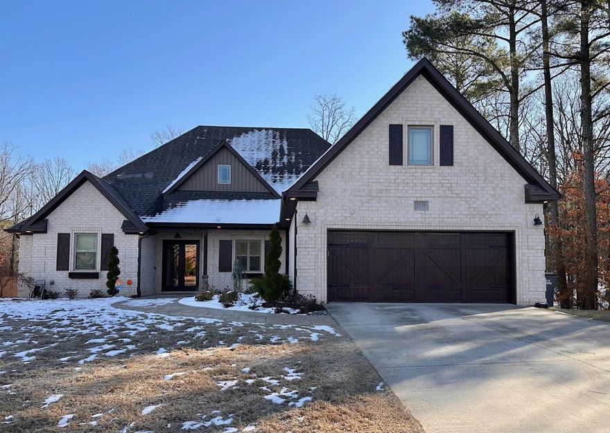 Four bedroom, three and a half bath home located in Harrison Hills Subdivision.