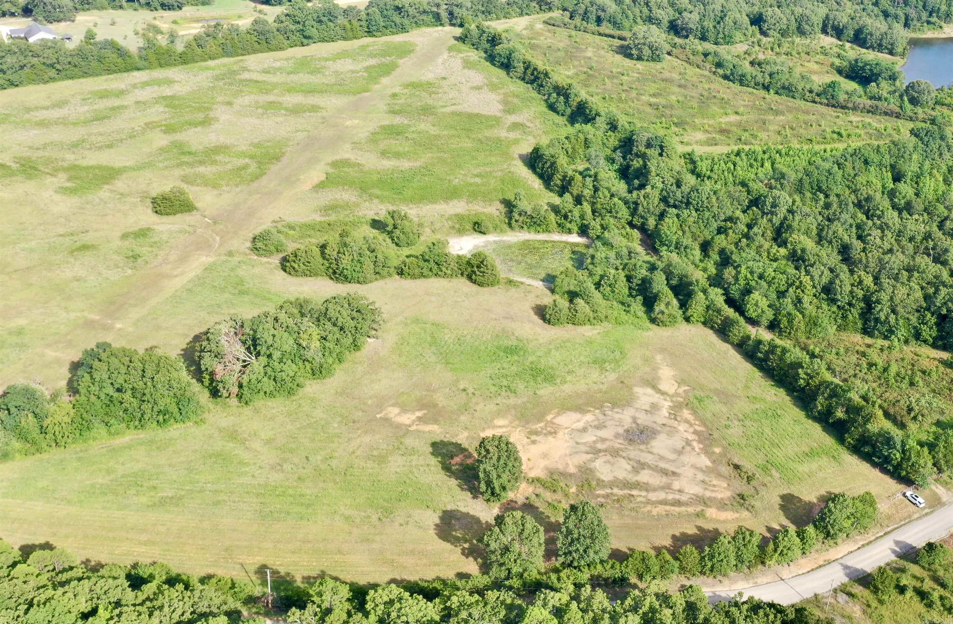 21 acres more or less with a pond, dead-end gravel road.