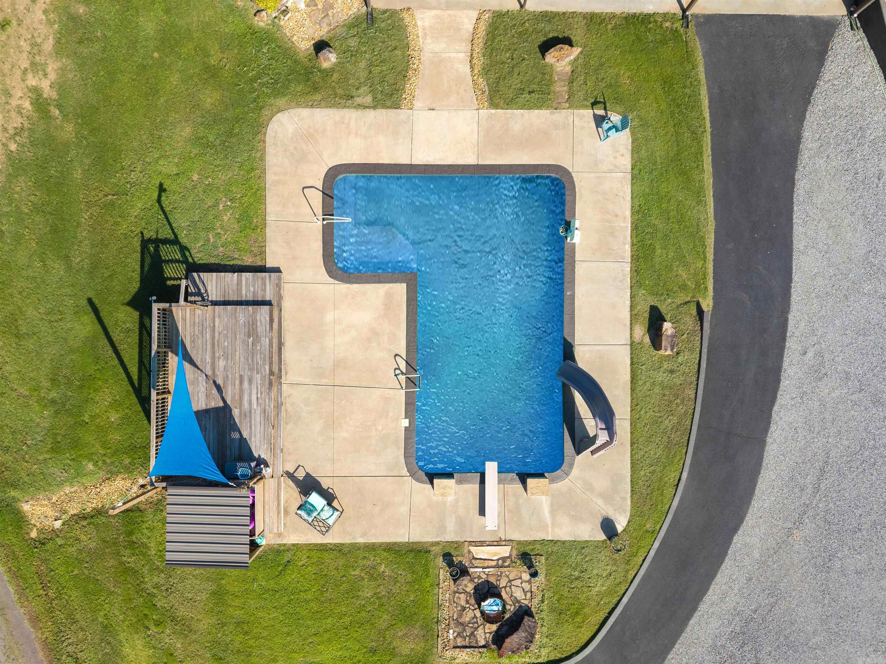 This newly renovated home is in pristine condition and loaded with quality craftsmanship and immaculate design. The property is almost 4 acres and comes with a barn, pond, and pasture for horse owners. It boasts a large L-shaped saltwater pool and the back porch extends the width of the home perfect for entertaining. The upper level has its own separate entry and showcases a large open concept living/dining/kitchen with an island covered in custom tortoise shell granite. The lower level of the house is also an open concept with a large living/dining/kitchen area. The oversized enclosed garage allows for parking multiple vehicles and room for workspaces. The detatched barn added in 2020 has ample space for storage and room for RV parking all enclosed. This incredible homestead is ideal for families in need of in-law quarters who need a separate living space. Each floor is fully equipped with its own full kitchen and laundry areas. This home is the best of both worlds offering private country living with Conway Corp utilities while affording easy access to the interstate and city amenities!