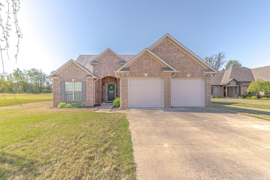 Welcome to Market 201 Hollis St. of the Craftsbury Village Sub. in Bono, AR within the Westside School District. Situated on a .40+/- acre fenced & tree lined lot is a 2011 built traditional style home wrapped in brick, topped w/ architectural shingles and accented by a mature Willow tree, gorgeous landscaping, shutters, gutters, a covered porch & patio, outbuilding, and 2 car garage w/ built in storage room & storm shelter. The interior features 1,987 sf of well laid out living space over 2 levels. The main level features an open concept living/dining/kitchen area w/ a large living room w/ concrete flooring & rich crown molding, dining room w/ arch accents, eat-in kitchen w/ bar seating, stainless steel appliances, ample cabinet & countertop space, and access to the patio. The Master wing includes a large bedroom w/ tray ceiling, walk-in closets, and an en-suite w/ dual vanity walk-in shower & jet tub. The spare wing features a bedroom and bathroom w/ shower tub combo. Upstairs is a landing, 2 bedrooms & bathroom w/ shower/tub combo. Conveniently located near favorite local amenities w/ easy access to the Interstate and 10 minutes to Jonesboro. Call to make this house your home.