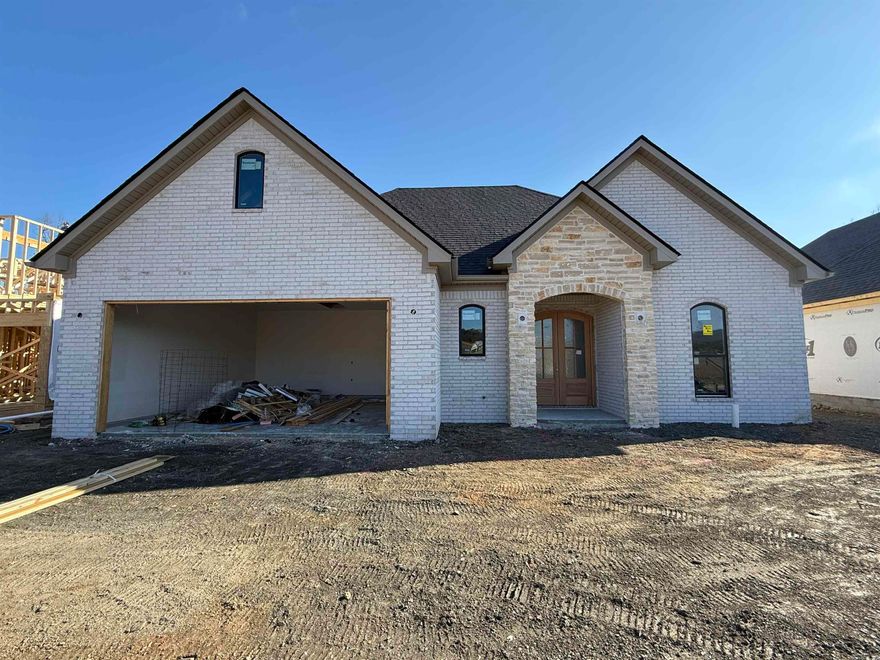 Welcome to Mountain Brook - West Little Rock’s newest premier community! Be among the first to plant roots in this highly anticipated development with the stunning new construction at 67 Mountain Brook. This thoughtfully designed single-level floor plan offers the perfect blend of style and function, featuring 3 spacious bedrooms, 2.5 baths, and a dedicated home office.  The heart of the home is an expansive open-concept living area that flows seamlessly into a private, low-maintenance, outdoor oasis. Imagine cozy evenings on your covered patio, complete with its own outdoor fireplace! The primary suite is a true retreat, featuring a spa-like bath with a freestanding tub, dual vanities, and a massive walk-in closet that connects directly to the laundry room for ultimate convenience.  Estimated completion is February 2026. Designer-curated finishes are coming soon, but if you act now, you can still put your personal touch on remaining selections!