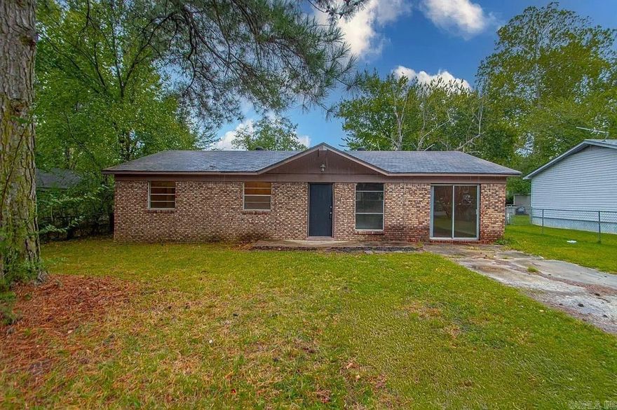 Welcome home to 17 Compass Point Street, a charming one-story brick residence tucked into Bamboo Village in Sherwood. Built in 1972 and offering approximately 1,296 square feet, this inviting home blends classic character with everyday comfort.  Step inside to a layout designed for easy living, featuring three bedrooms and one full bath. The spacious living area flows into an eat-in kitchen—perfect for morning coffee, casual dinners, or gathering with friends. Central heat and air provide year-round comfort, and the traditional single-story design makes daily routines feel effortless.  Outside, the level lot offers room to relax, garden, or entertain. A concrete driveway and patio space add convenience and opportunity for outdoor enjoyment. The brick and frame exterior gives timeless curb appeal.  If you’ve been looking for a home that feels welcoming from the moment you arrive, this one is ready for its next chapter.