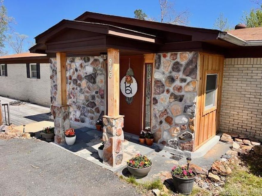 Great family home in well established neighborhood in Fountain Lake Schools. This house has been completely updated with all current modifications. Huge living room with wood & beam ceilings plus enough space to fit your enormous TV, open kitchen/dining floor plan with plenty of room to sit all the kids, good size bedrooms, walk-in closets, spacious bathrooms with walk-in showers, etc.... Outside you'll find two decks for lounging, 30x40 workshop/garage, outside storage/dog kennel or chicken coop (make it what you will). Lots of room for the kids to play including concrete basketball court. New roof May 2025. Hot Springs Village lot can also be included at list price.