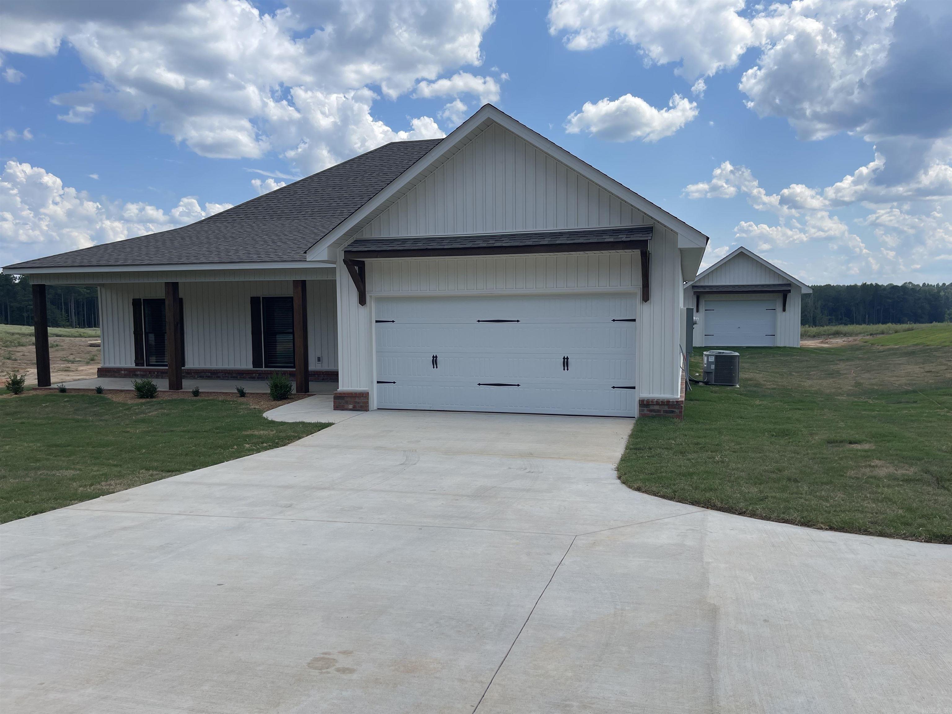 Great opportunity to own your dream home. Beautiful new construction with country atmosphere on one acre lot. Open floor plan with brick fireplace in living area. Primary bedroom features two large closets, double vanities and separate walkin shower. Covered back patio and 14 X 22 shop in backyard. Builder is installing privacy fence in part of backyard. Seller will pay $5,000.00 of buyer's closing cost with acceptable offer