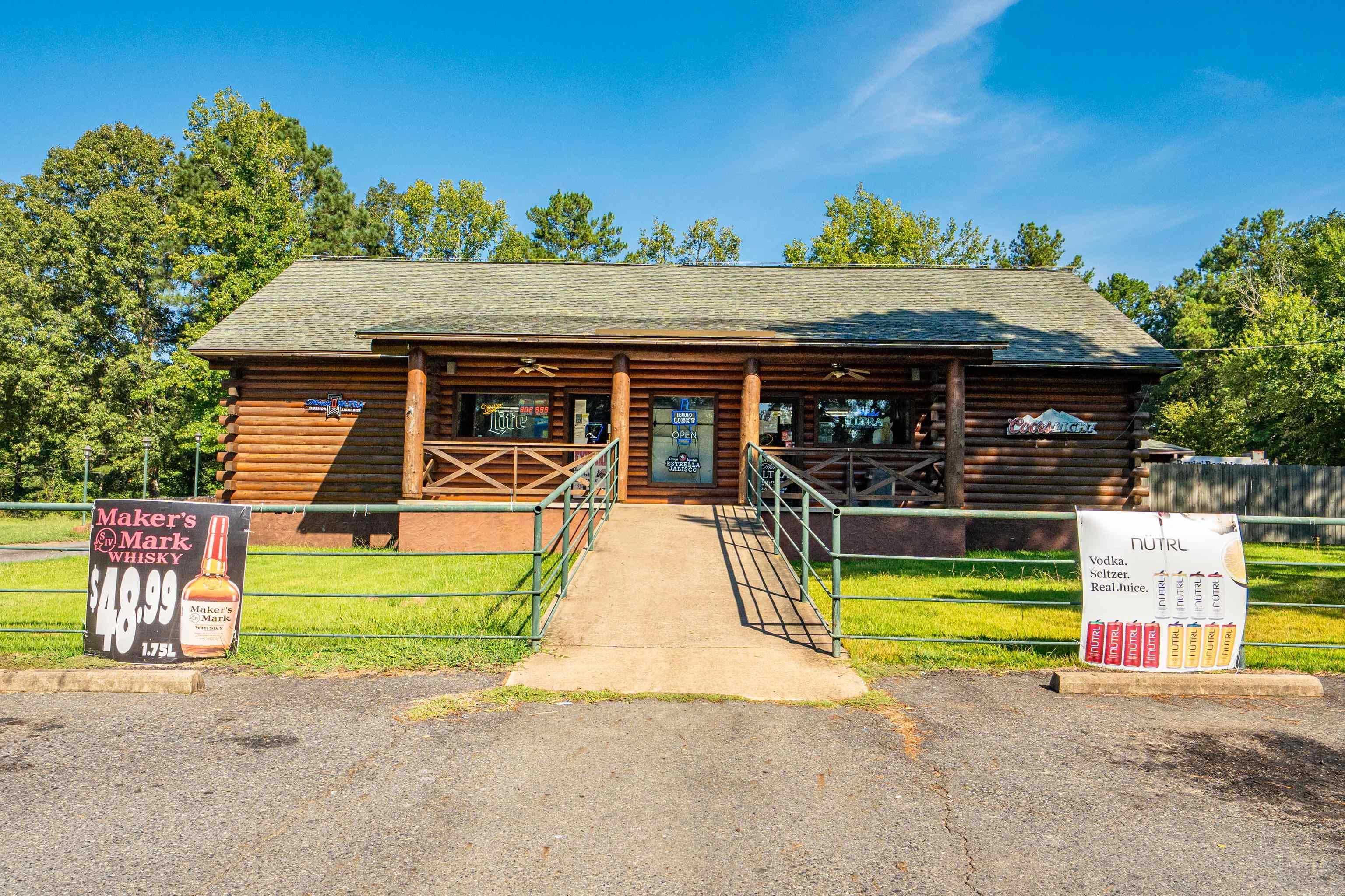 Exceptional opportunity to own the well-established Log Cabin Liquor store on the high-traffic Highway 70 West with excellent visibility and accessibility. The sale includes the building, business, fixtures, equipment, and full inventory, providing a seamless transition for anew owner. The property features a convenient drive-through for easy grab and go, handicap accessibility to the store and restrooms, and an additional building for extra storage. This turn-key operation is fully stocked and ready for immediate ownership, making it ideal for an experienced operator or an investor seeking a strong addition to their portfolio. With both the real estate and established business included, this is a rare chance to step into ownership of a profitable, ready-made enterprise.