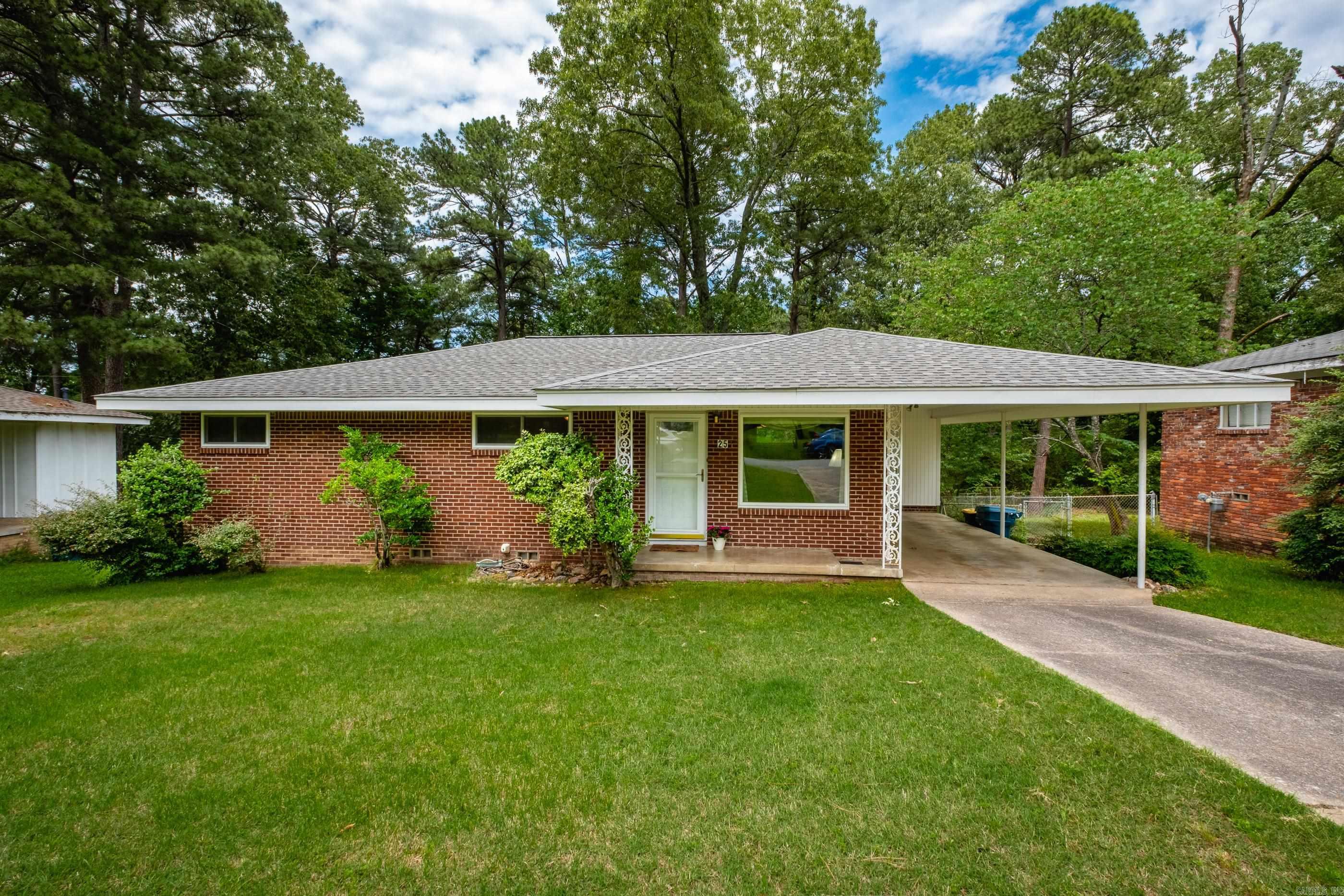 Well-maintained and much loved home in the heart of Broadmoor. This brick 3 bedroom, 2 bath home has a large living space and nice sized kitchen. HVAC 2022; WH 2018. Beautiful, original hardwood floors in the bedrooms. (Hardwood is under the carpet in other areas and possibly all other carpet areas, but would need to be verified.) Primary bedroom has an ensuite bath. Both full baths have vintage tile. Separate laundry/utility room off the dining room with a separate entrance to the home. Large fenced backyard with gorgeous trees. Close proximity to UALR, UAMS, and I-630 with quick access to both downtown and west LR. Conveniently located near numerous restaurants and shopping. Agents, see remarks.